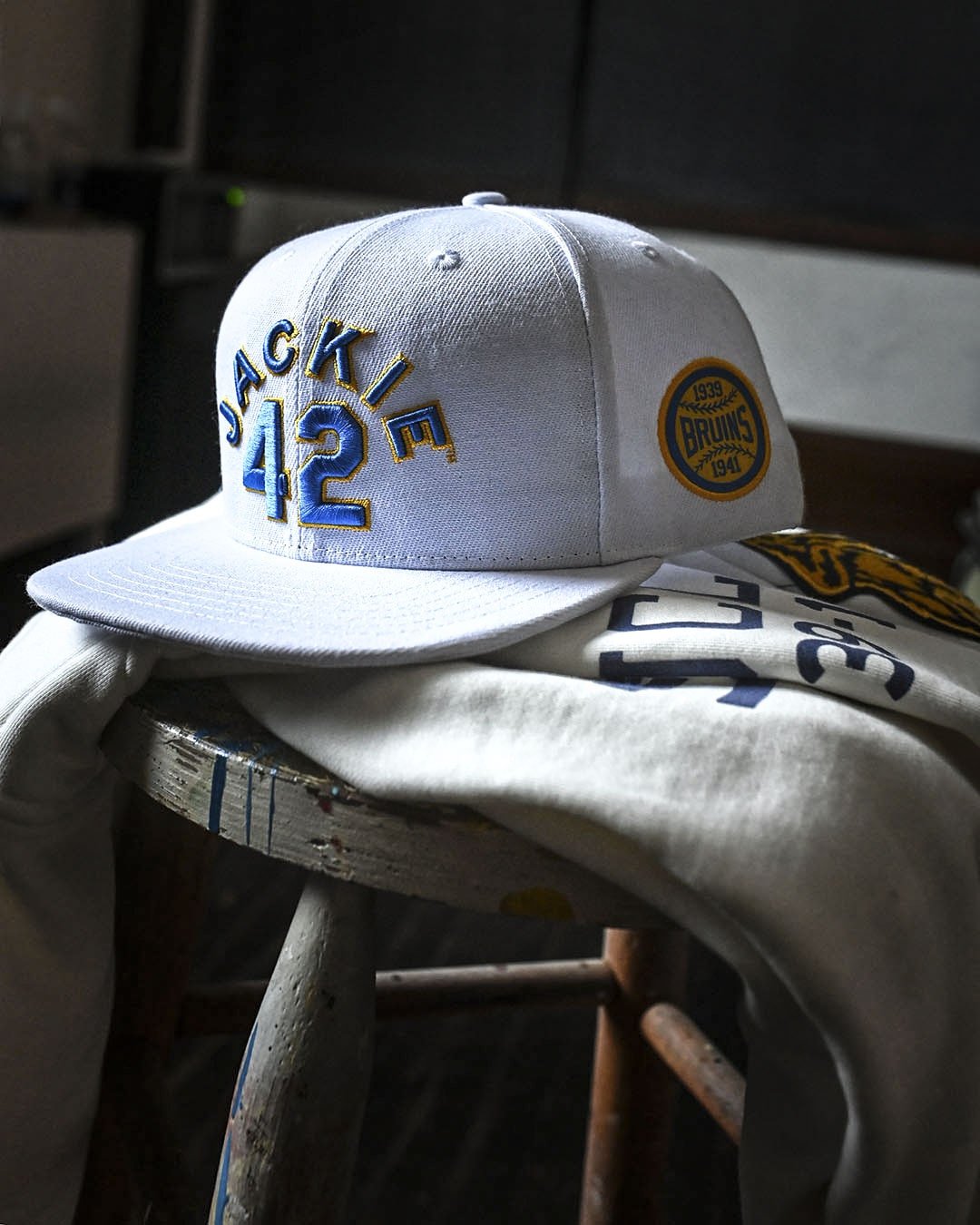UCLA - Robinson Legacy #42 White Snapback Hat - Roots of Fight Canada