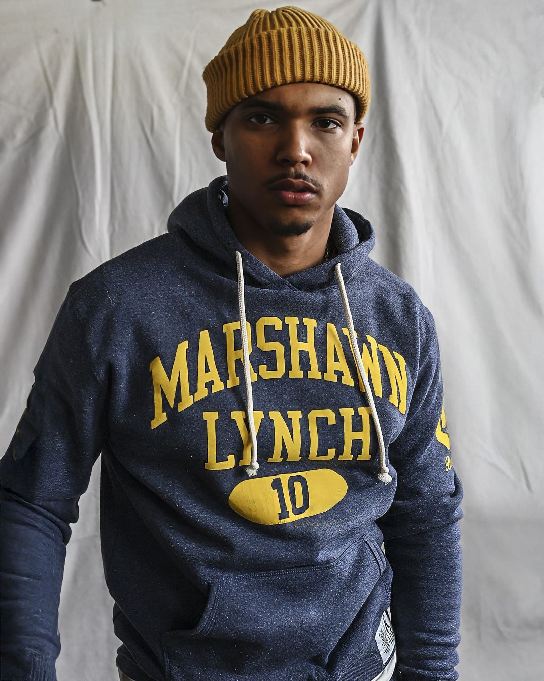 CAL - Marshawn Lynch #10 Navy PO Hoody - Roots of Fight Canada