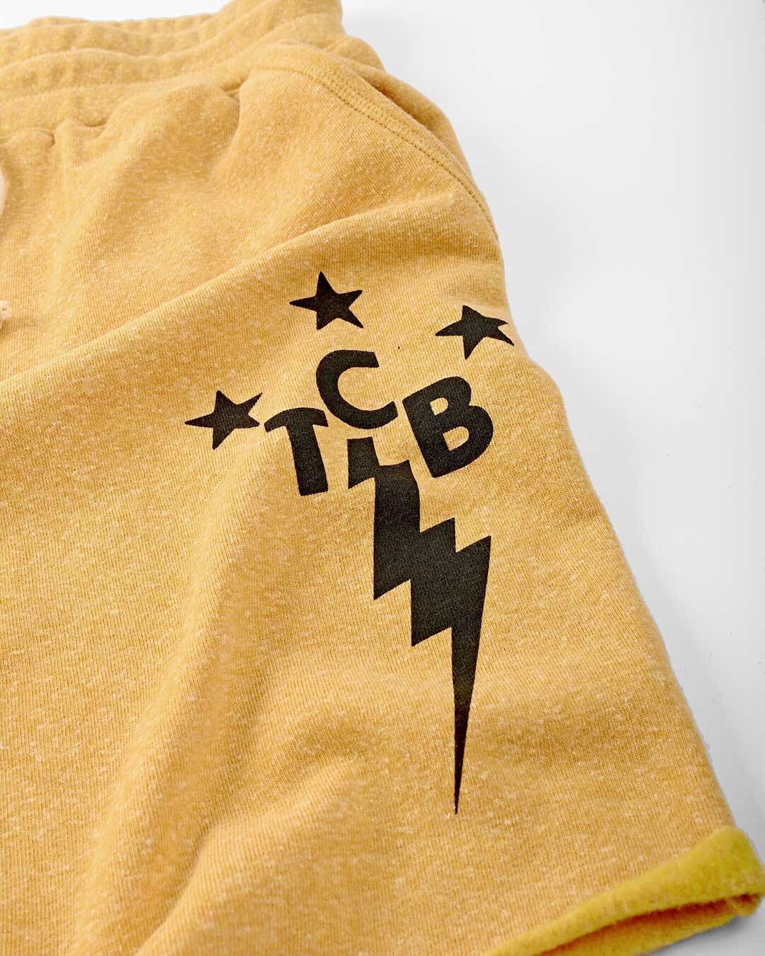 Elvis Presley TCB Gold Shorts - Roots of Fight Canada