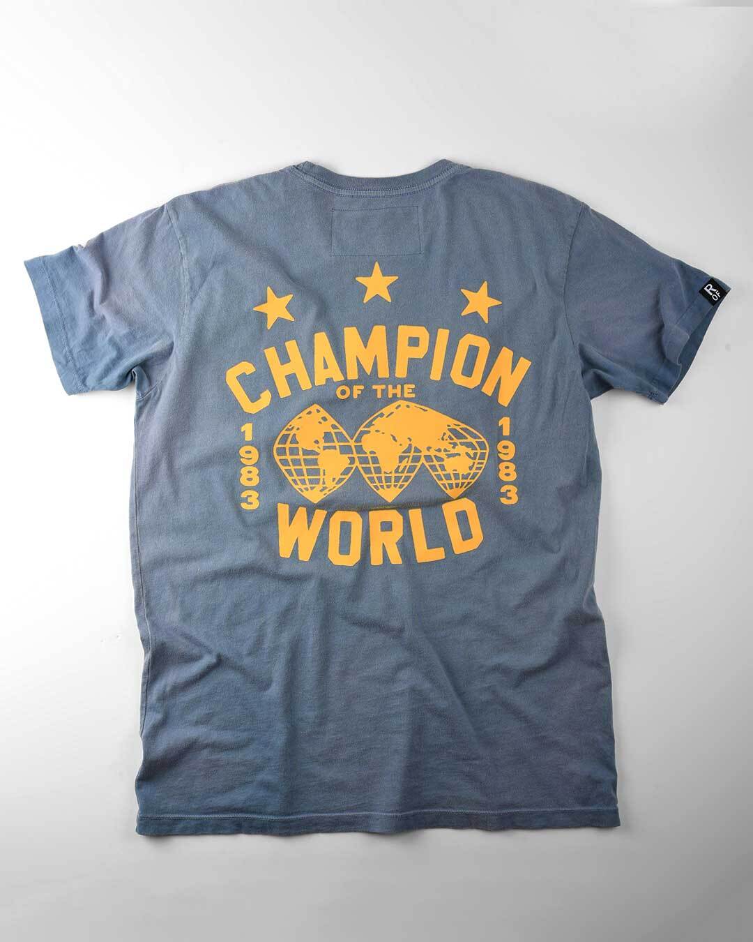 The Iron Sheik 1983 Champ Blue Tee - Roots of Fight