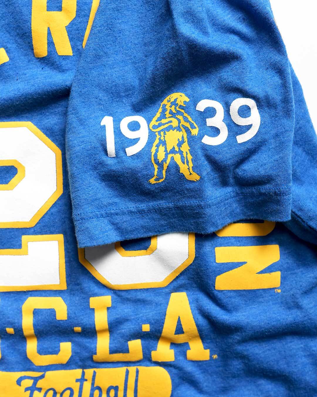 UCLA - Jackie Robinson Football Blue Tee - Roots of Fight Canada